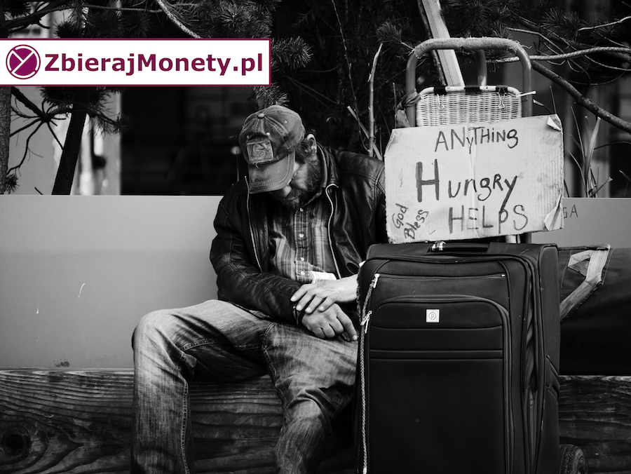 Bezdomny proszący o pieniądze na jedzenie.